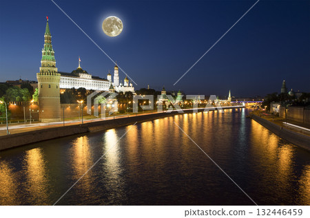 Night view of the Moskva River and Kremlin, Russia, Moscow (most popular view). Against the background of a beautiful sky with clouds, with the moon Night view of the Moskva River and Kremlin, Russia, Moscow (most popular view). Against the background of a beautiful sky with clouds, with the moon 132446459