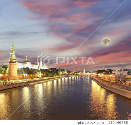Night view of the Moskva River and Kremlin, Russia, Moscow (most popular view). Against the background of a beautiful sky with clouds, with the moon Night view of the Moskva River and Kremlin, Russia, Moscow (most popular view). Against the background of a beautiful sky with clouds, with the moon 132446488