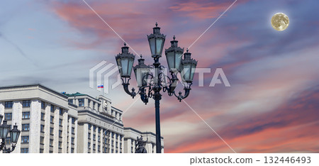 Building of The State Duma of the Federal Assembly of Russian Federation on a beautiful sky with cloud before sunset background (with the super moon), Moscow, Russia 132446493