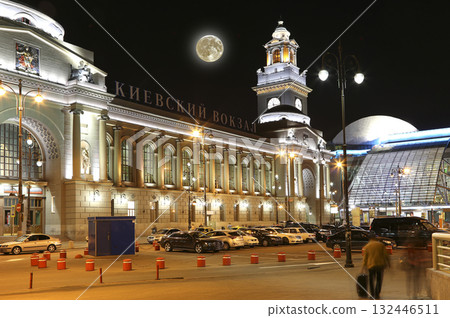 Kiyevskaya railway station (written in Russian)  lit at night --  with the super moon, Moscow, Russia 132446511