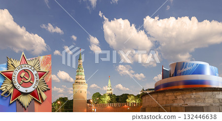 Moscow Kremlin (with decorations for the holiday of May 9 in honor of Victory Day celebration (WWII). Against the sky with clouds, Russia. TRANSLATION: Victory!, Patriotic war Moscow Kremlin (with decorations for the holiday of May 9 in honor of Victory Day celebration (WWII). Against the sky with clouds, Russia. TRANSLATION: Victory!, Patriotic war 132446638
