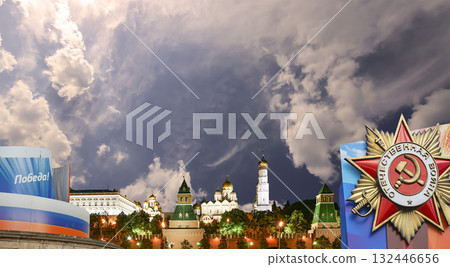 Moscow Kremlin (with decorations for the holiday of May 9 in honor of Victory Day celebration (WWII). Against the sky with clouds, Russia. TRANSLATION: Victory!, Patriotic war 132446656