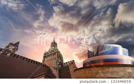 Moscow Kremlin (with decorations for the holiday of May 9 in honor of Victory Day celebration (WWII). Against the sky with clouds, Russia. TRANSLATION: Victory! 132446659