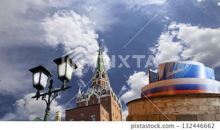 Moscow Kremlin (with decorations for the holiday of May 9 in honor of Victory Day celebration (WWII). Against the sky with clouds, Russia. TRANSLATION: Victory! 132446662