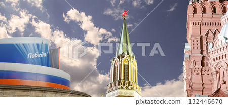 Moscow Kremlin (with decorations for the holiday of May 9 in honor of Victory Day celebration (WWII). Against the sky with clouds, Russia. TRANSLATION: Victory! 132446670