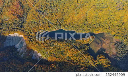 Biogradsko lake surrounded by mountains covered with bright autumn trees 132446909