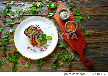 Veal sirloin, mashed potatoes chards and shallots 132448317