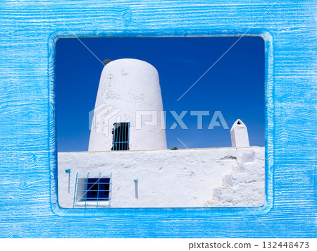 blue wood frame with Formentera windmill 132448473