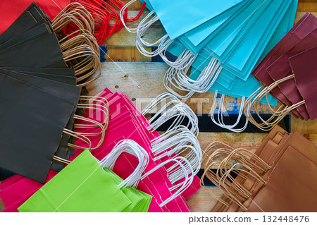 Paper bags factory colorful set on wood Paper bags factory colorful set on wood 132448476