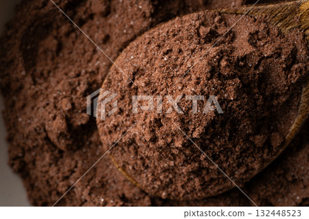 Close-up of cocoa powder with sugar on a spoon 132448523