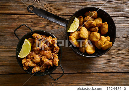 Tapas Adobo fried fish and puntilla skid breaded 132448640
