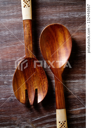 wood spoon and fork on wooden board 132448667