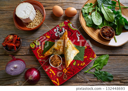 Moroccan Spinach and cheese Briouat Moroccan Spinach and cheese Briouat 132448693