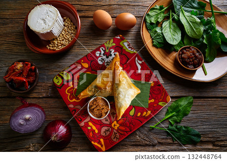 Moroccan Spinach and cheese Briouat 132448764