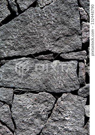 Black lava stone volcanic masonry wall Black lava stone volcanic masonry wall 132448790