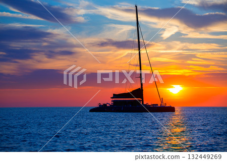 Ibiza san Antonio Abad catamaran sailboat sunset Ibiza san Antonio Abad catamaran sailboat sunset 132449269