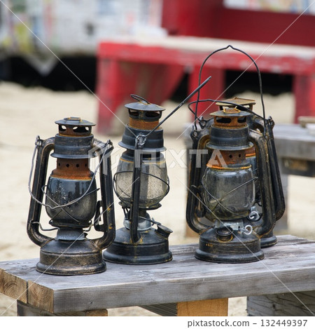A lantern at a seaside campsite 132449397
