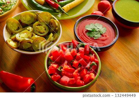 Mexican food mixed guacamole nachos chili sauce 132449449
