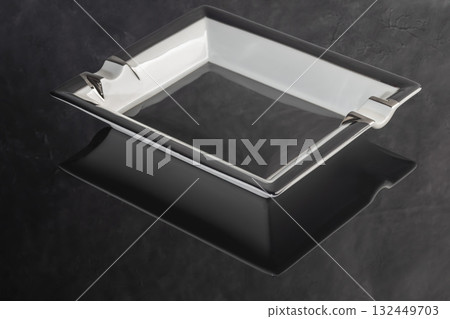 Large porcelain cigar ashtray on a marble background. Ash collector. 132449703