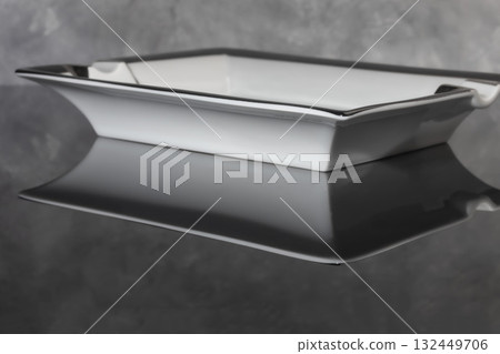 Large porcelain cigar ashtray on a marble background. Ash collector. 132449706