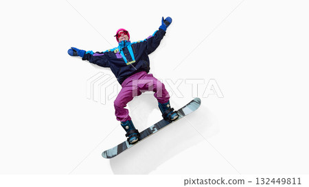 Cheerful female snowboarder lying on back with arms spread isolated on white background 132449811