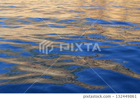 Abstract golden reflection blue water shapes 132449861