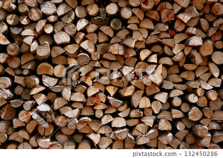 Cut firewood stack logs as pattern 132450286
