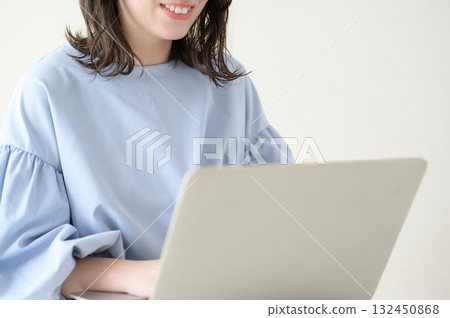 A Japanese woman operating a personal computer A Japanese woman operating a personal computer 132450868
