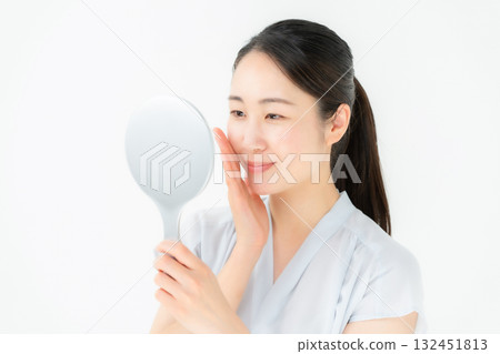 Woman looking in the mirror Beauty Woman looking in the mirror Beauty 132451813