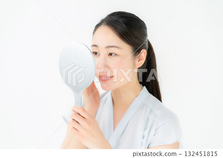 Woman looking in the mirror Beauty Woman looking in the mirror Beauty 132451815