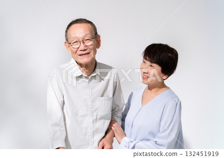 Senior couple portrait walking stick Senior couple portrait walking stick 132451919