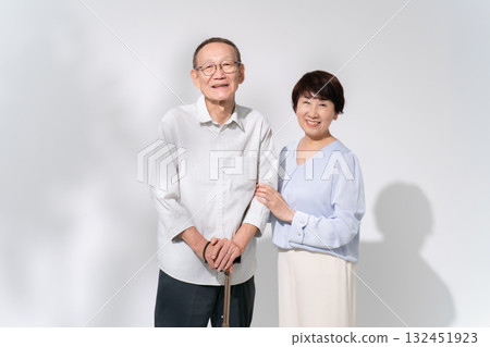 Senior couple portrait walking stick Senior couple portrait walking stick 132451923