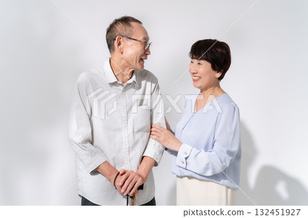 Senior couple portrait walking stick 132451927