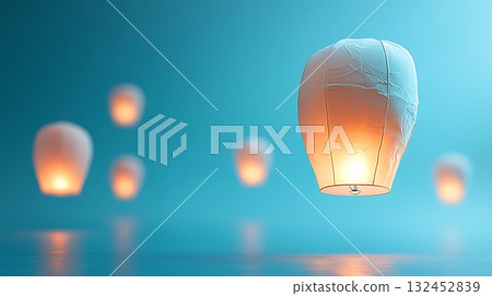 Ethereal Floating Lanterns Lighting Up the Night Sky in Calm Blue Atmosphere Ethereal Floating Lanterns Lighting Up the Night Sky in Calm Blue Atmosphere 132452839