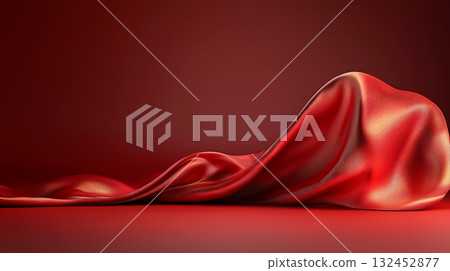 Smooth Red Fabric Draped Elegantly Over a Solid Background Creating a Luxurious Atmosphere 132452877