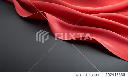 Smooth Red Fabric Draped Elegantly Against Dark Background for Textile and Design Concepts Smooth Red Fabric Draped Elegantly Against Dark Background for Textile and Design Concepts 132452886