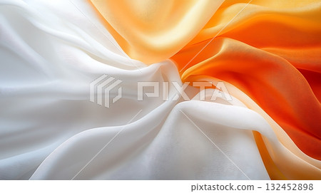 Soft and Flowing Fabric in White and Orange Creating Elegant Drapery and Texture Soft and Flowing Fabric in White and Orange Creating Elegant Drapery and Texture 132452898