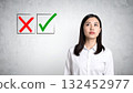 A young woman in an apron 132452977
