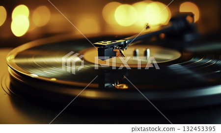 Close-Up of Vintage Vinyl Record Player with Stylus on Turning Disc in Soft Light 132453395