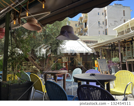 Outdoor cafe, favela, in Thessaloniki, Greece. Mainly visited by not rich locals, tourists rarely seen here. Thessaloniki, Greece Outdoor cafe, favela, in Thessaloniki, Greece. Mainly visited by not rich locals, tourists rarely seen here. Thessaloniki, Greece 132454511