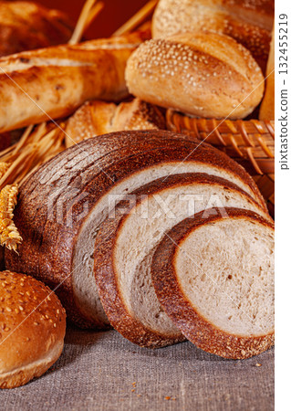 Fresh baked bread. Assorted bakery products loafs of bread and rolls... 132455219