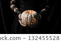 Elegant Hands in Black Lace Holding White Victorian Jack-o-Lantern 132455528