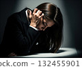 Distressed businesswoman crying, overwhelmed with sadness and emotional pain 132455901