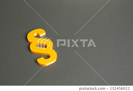 Golden Paragraph sign. Court and justice, fairness. Law, professional ethics, and social responsibility. Company policy. Lawyer services. Legal assessment. Golden Paragraph sign. Court and justice, fairness. Law, professional ethics, and social responsibility. Company policy. Lawyer services. Legal assessment. 132456012