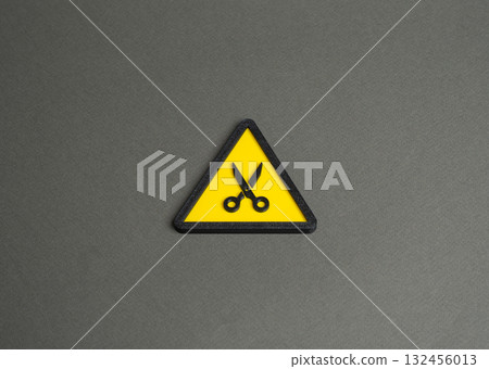 Cutting Scissors. Budget cuts, salary and benefit reductions. Staff reductions. Reduction in operating hours and services. Reduction, optimization, and financial restraint. 132456013