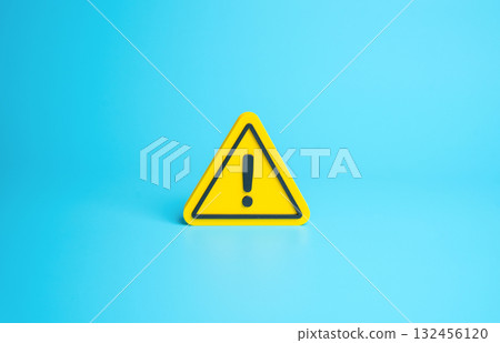 Attention sign on a blue background. Important things to remember. Safety, reliability, and information security in workplaces, industries, and urban environments. 132456120