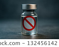 Glass vial containing clear liquid, featuring prominent red prohibition symbol its label, set against dark background. image conveys sense 132456142