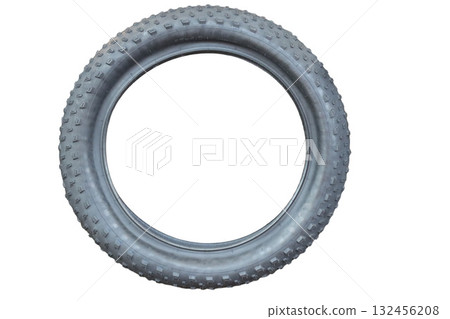 Fat bike tire showing knobby tread for off road adventures Fat bike tire showing knobby tread for off road adventures 132456208