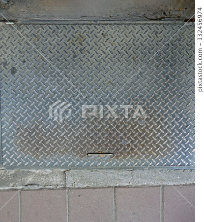 Metal shaft pattern on street Metal shaft pattern on street 132456974