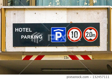 Garage entrance sign on street 132457111